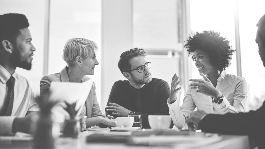 ‘We take notes, we have eye contact’: How phone bans at work affect meetings and culture